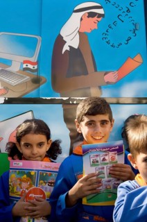 Latakia Countryside, Syria. October 18th 2010 Syrian schoolchildren collecting books from a mobile