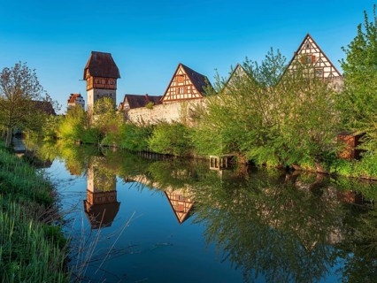 View of the old town with half-timbered houses, towers and city wall, left the Bäuerlinsturm,