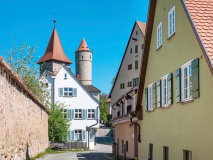 Alley on the city wall with defensive towers and town houses, Epiphany Tower and Green Tower,