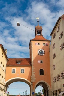 Regensburg, Germany. October 7th 2024 Regensburg Clock Tower at the entrance of the Stone Bridge,