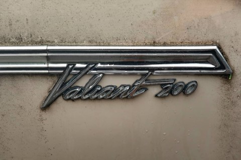 Rhine Falls, Switzerland. 26th September 2024 Badge of a Plymouth Valiant 200 four-door sedan car,