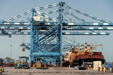 Abu Dhabi, United Arab Emirates. June 27th 2019. Shipping containers being loaded onto a ship at