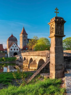 Ornbau im Altmühltal in the evening light, medieval stone bridge over the river Altmühl, Altmühl