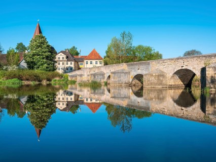 The Stone Bridge, medieval stone bridge over the Wörnitz river near the small village of Ebermergen