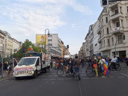 May Day, large crowd on Labor Day with bicycles and banners at an urban demonstration, Maidemo,