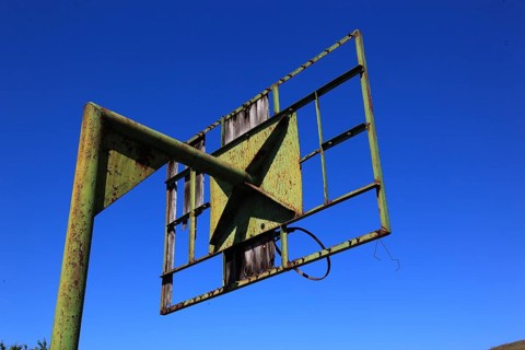 Rusty frame of an old basketball hoop, metal frame, basketball, rusted