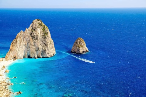 The Mizithres are two spectacular rock formations rising majestically from the azure Ionian Sea off