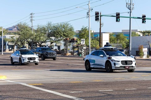 Waymo self-driving autonomous vehicles driverless cars from Google and Jaguar Robotaxi in Phoenix,