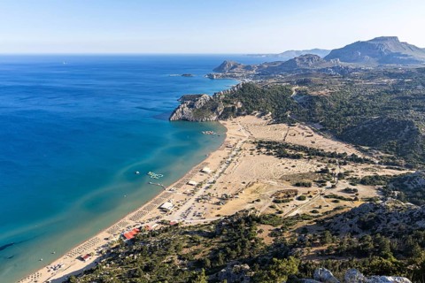 View of Tsambika beach from above Mediterranean seaside island of Rhodes, Greece