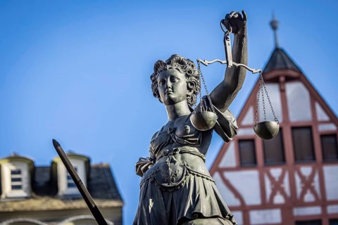 Justice, statue of the Roman goddess of justice. Römerberg, Downtown Frankfurt am Main, Hesse,