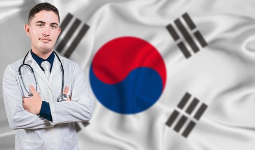 Portrait of medical professional on South Korea flag background. South Korean national health