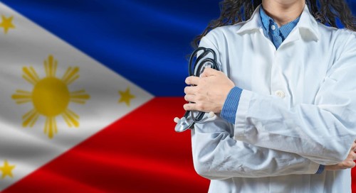 Healthcare professional with Philippines flag background. Professional doctor holding stethoscope