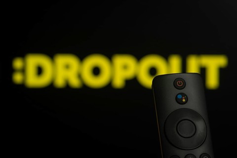 Dhaka, Bangladesh- 21 Jan 2026: Close-up of a smart TV remote control against a blurred Dropout