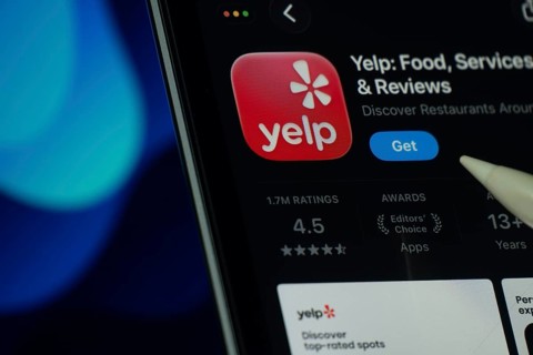 Dhaka, Bangladesh- 24 Oct 2025: A iPad screen displaying the Yelp app on App store
