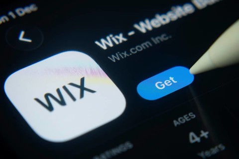 Dhaka, Bangladesh- 01 Dec 2025: A close-up of the Wix app icon in the App Store on an iPad screen