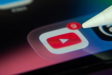 16 Nov 2025- Dhaka, Bangladesh: Stylus touching the youtube app icon with a notification on a