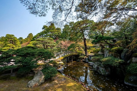 Gonaitei Garden with Dobashi Bridge over a pond, Japanese Garden, Kyoto Imperial Palace, Kyoto,