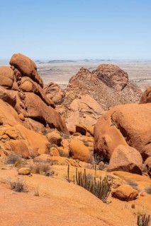 Rocks under a blue sky in the dry desert landscape of Spitzkoppe, Spitzkoppe, Erongo, Namibia