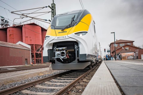 Modern train on the tracks with technical details in the foreground, Siemens Micro Plus B battery