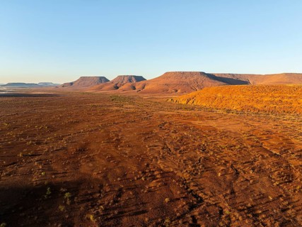 Aerial view, arid desert landscape, hills in Damaraland, Namibia