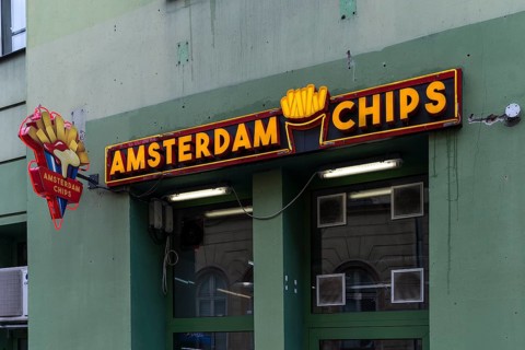 Illuminated advertising for chips, Krakow, Poland