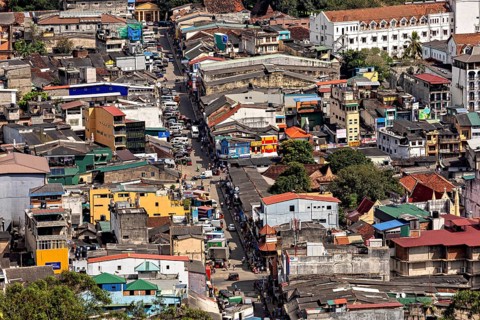 Bird's eye view of a city with colorful buildings, lively atmosphere and architecture, view of the