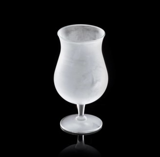 Frosted balloon glass, tulip glass against black background, studio shot