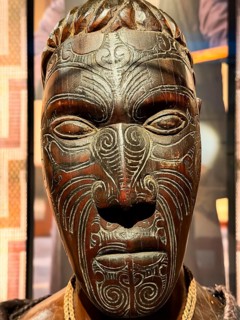 Head, carved wooden figure with artistic pattern, Maori art, Museum Five Continents, Bavaria,