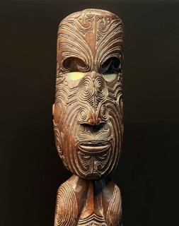 Carved wooden figure with artistic pattern, Maori art, Museum Five Continents, Bavaria, Germany