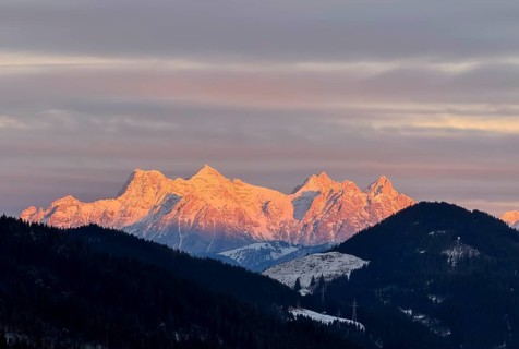 Alpine glow at sunset, mountain peaks of the Loferer Steinberge in winter, Kitzbühel Alps, Tyrol,