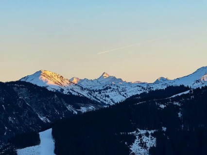 Grossglockner mountain peak in evening light at sunset, seen from Hochbrixen, Kitzbühel Alps,
