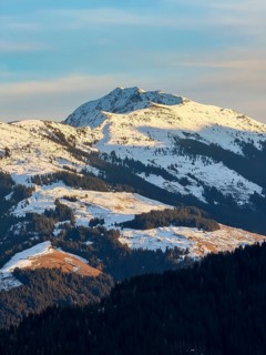 Snowy mountain peak in evening light, Kelchsau, Kitzbühel Alps, Tyrol, Austria