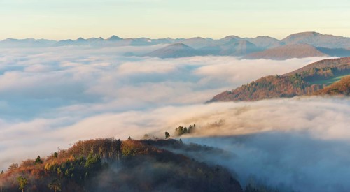 View from the Gisliflue of the Jura foothills covered in fog, in morning light, Talheim, Canton,