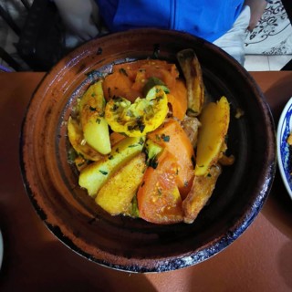 Traditional Moroccan tagine with mixed vegetables in a clay pot, Morocco