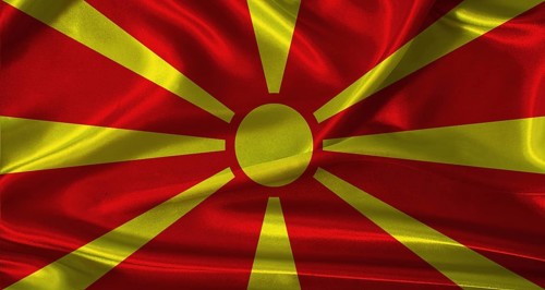 National flag of North Macedonia with cloth texture. North Macedonia flag with realistic texture