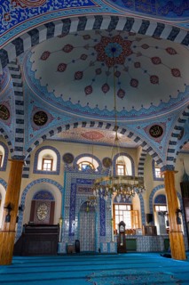 Traditional mosque interior with blue dome and ornate ornaments, spiritual atmosphere, Kapu Mosque,
