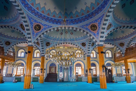 Magnificent mosque interior with blue dome and rich ornaments, atmospheric and sublime, Kapu