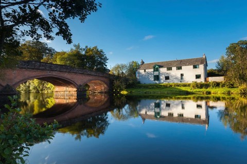 Callander, Pertshire, Scotland, UK. The red bridge over the river Teith