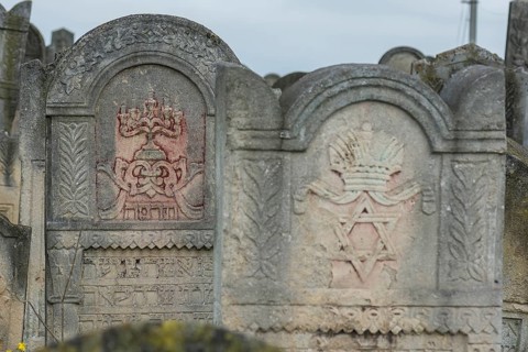 Coloured relief of a five-armed candleholder on a tombstone, Jewish cemetery, since 1866,
