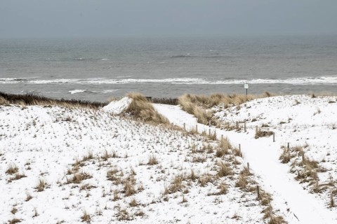 Snow-covered dunes on the North Sea, Langeoog, Lower Saxony, Germany