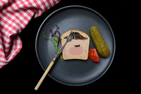 Battered pate on plate with microgreen
