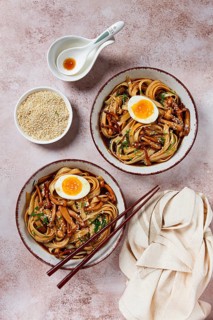 Buckwheat noodles soba with shimeji mushrooms, with boiled egg, green onion, sesame seeds,