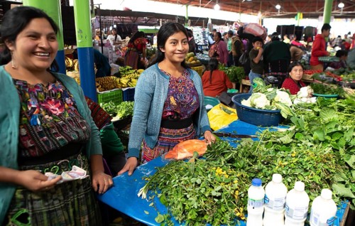 Mayan woman wearing traditional clothes at the market in Sololá, Highlands, Sololá Department,