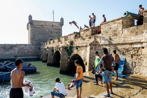 Children playing on the promenade, Essaouira, UNESCO World Heritage Site, Atlantic coast, Morocco