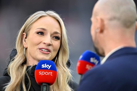 SKY presenter reporter Katharina Kleinfeldt, portrait in interview microphone micro logo with