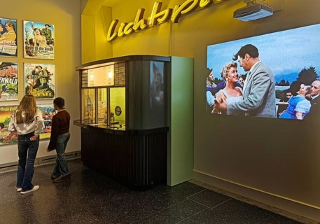 Cinema from the 1950s as a presentation with movie posters, box offices and original films, House