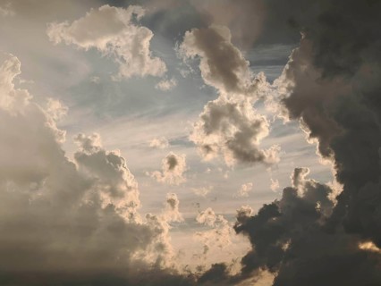 Solid clouds are penetrated by sunlight and create a dramatic spectacle, Germany
