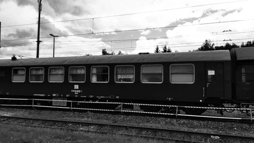 Side view of a historic railroad car on rails with visible windows, nostalgic, Franconian Forest