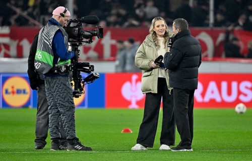 RTL TV expert Lothar Matthäus interviewed with reporter presenter Laura Papendick microphone micro