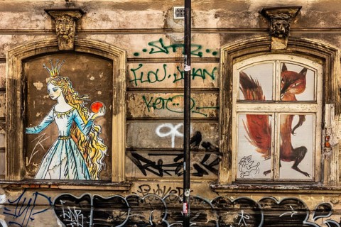 Street art on the wall of a building in the Kazimierz Jewish Quarter, a historically significant,